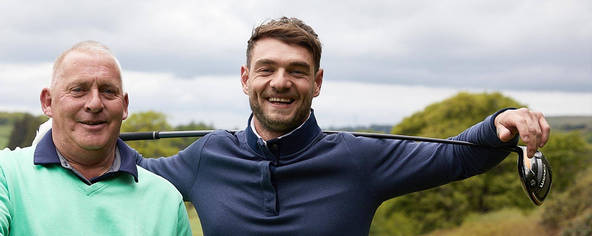 Pair of golfers laughing