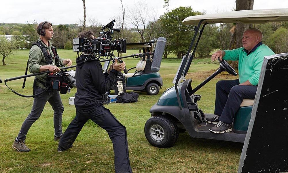 Film crew on a golf course